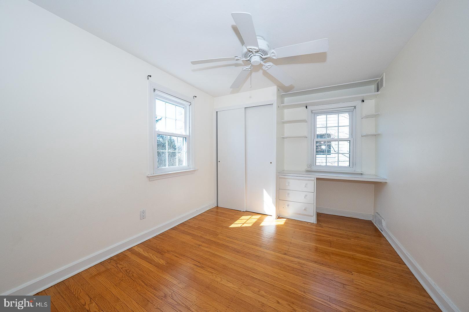 128 Homestead Road Wayne, PA 19087 - Photo 18 of 30 wooden floor in an empty room with a window