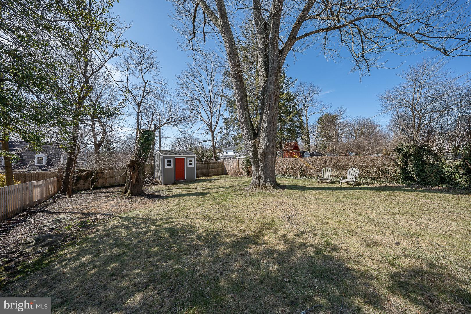 128 Homestead Road Wayne, PA 19087 - Photo 27 of 30 a view of a yard with a tree