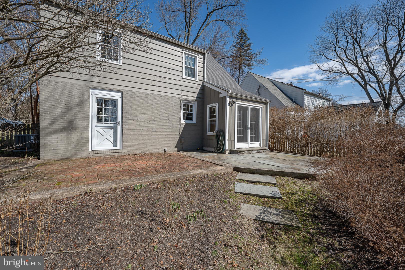 128 Homestead Road Wayne, PA 19087 - Photo 29 of 30 a front view of a house with a yard