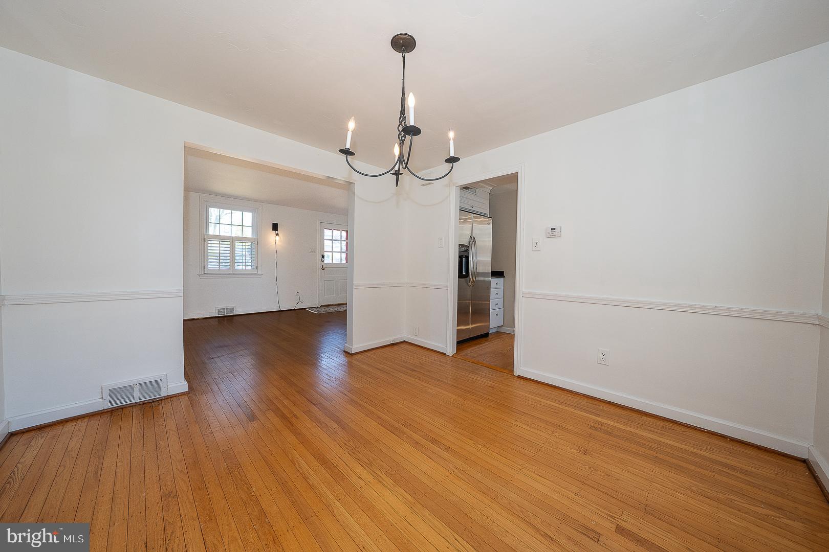 128 Homestead Road Wayne, PA 19087 - Photo 8 of 30 a view of a room with wooden floor ceiling fan and window