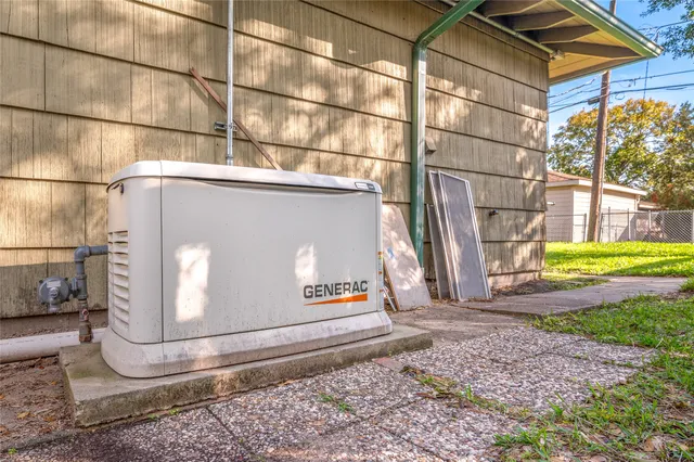 a side view of a house with a yard
