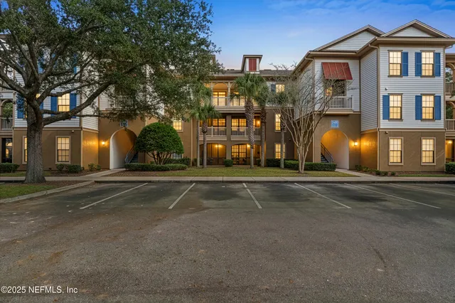a view of a building with a street