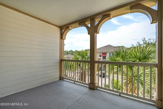a view of a balcony with lake view