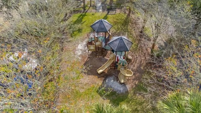 a view of a swimming pool with an outdoor space and seating area