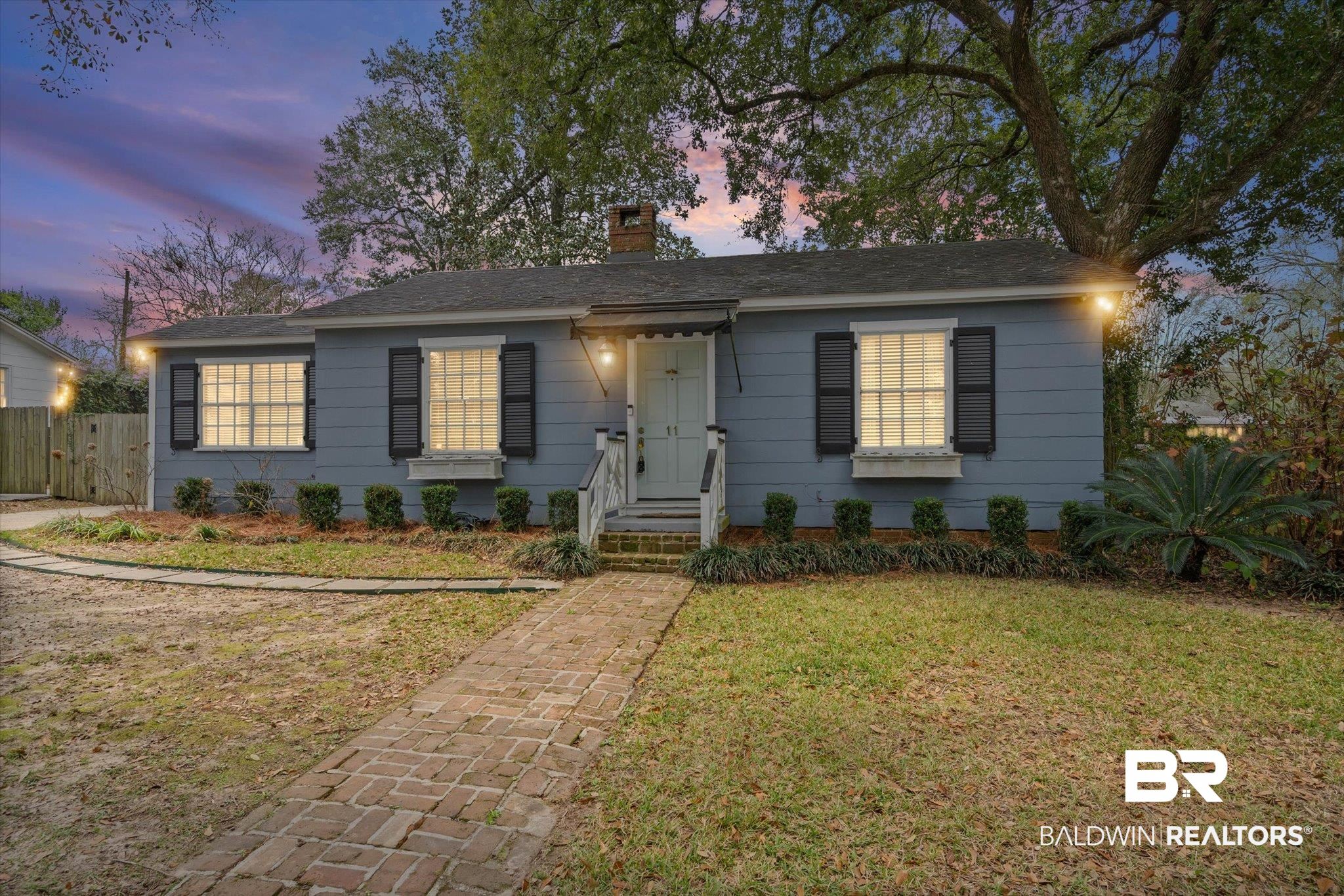 11 York Place Mobile, AL 36608 - Photo 22 of 24 View of front of house featuring a chimney