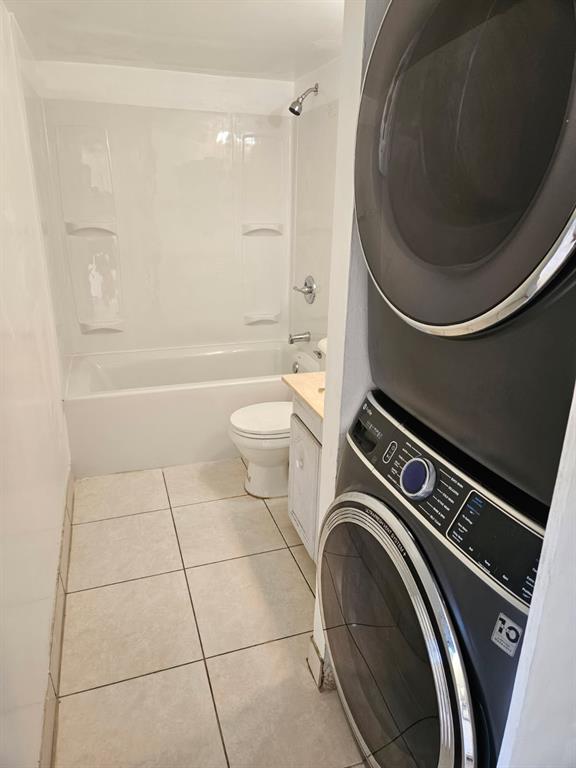 8401 West Sample Road, Unit 36 Coral Springs, FL 33065 - Photo 10 of 11 a bathroom with a toilet and a bathtub