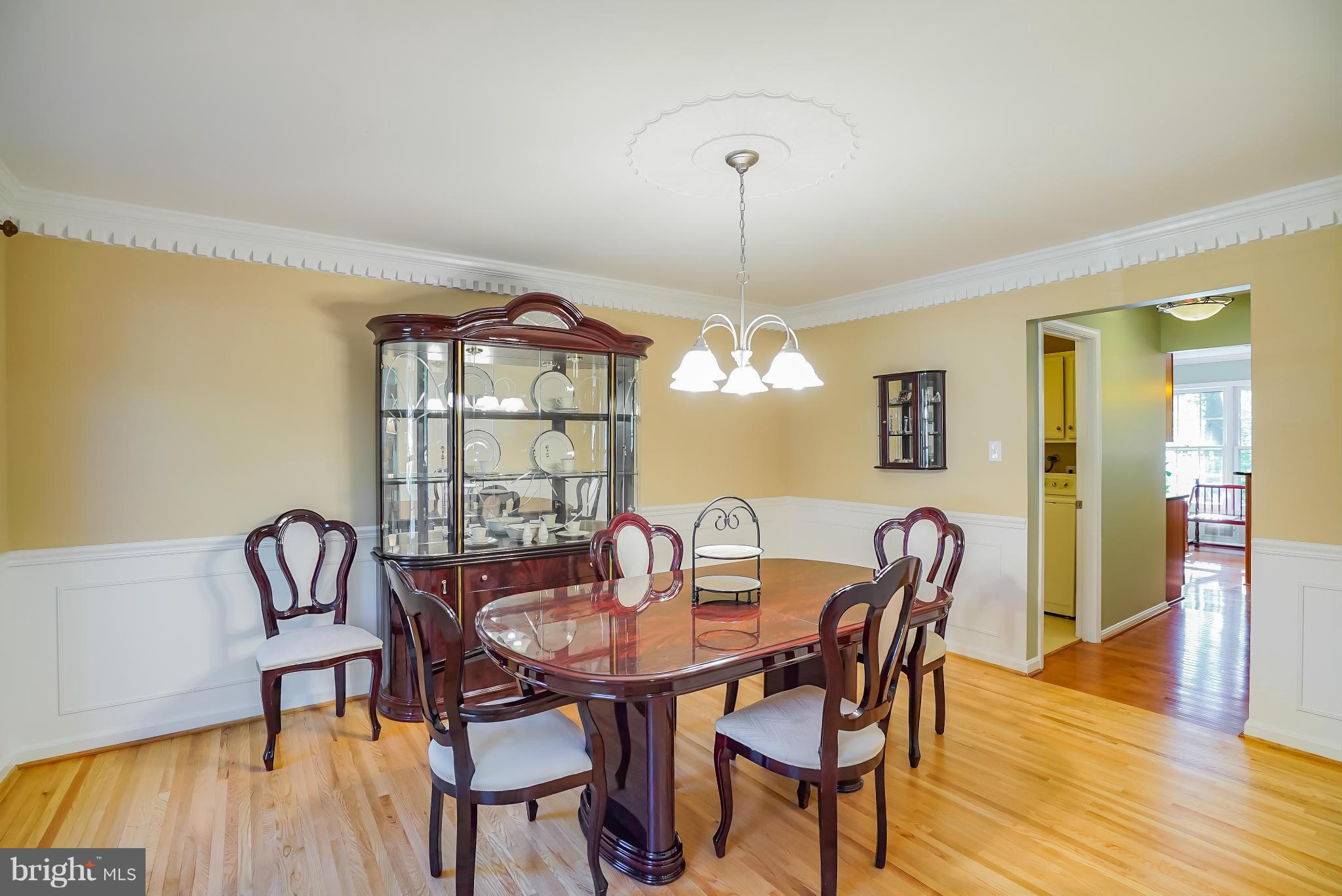 11811 Grey Birch Place Reston, VA 20191 - Photo 13 of 30 a view of a dining room with furniture window and wooden floor