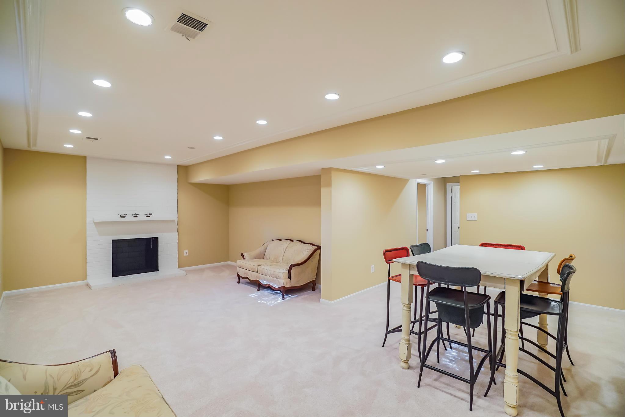 11811 Grey Birch Place Reston, VA 20191 - Photo 23 of 30 a kitchen with a table and chairs in it