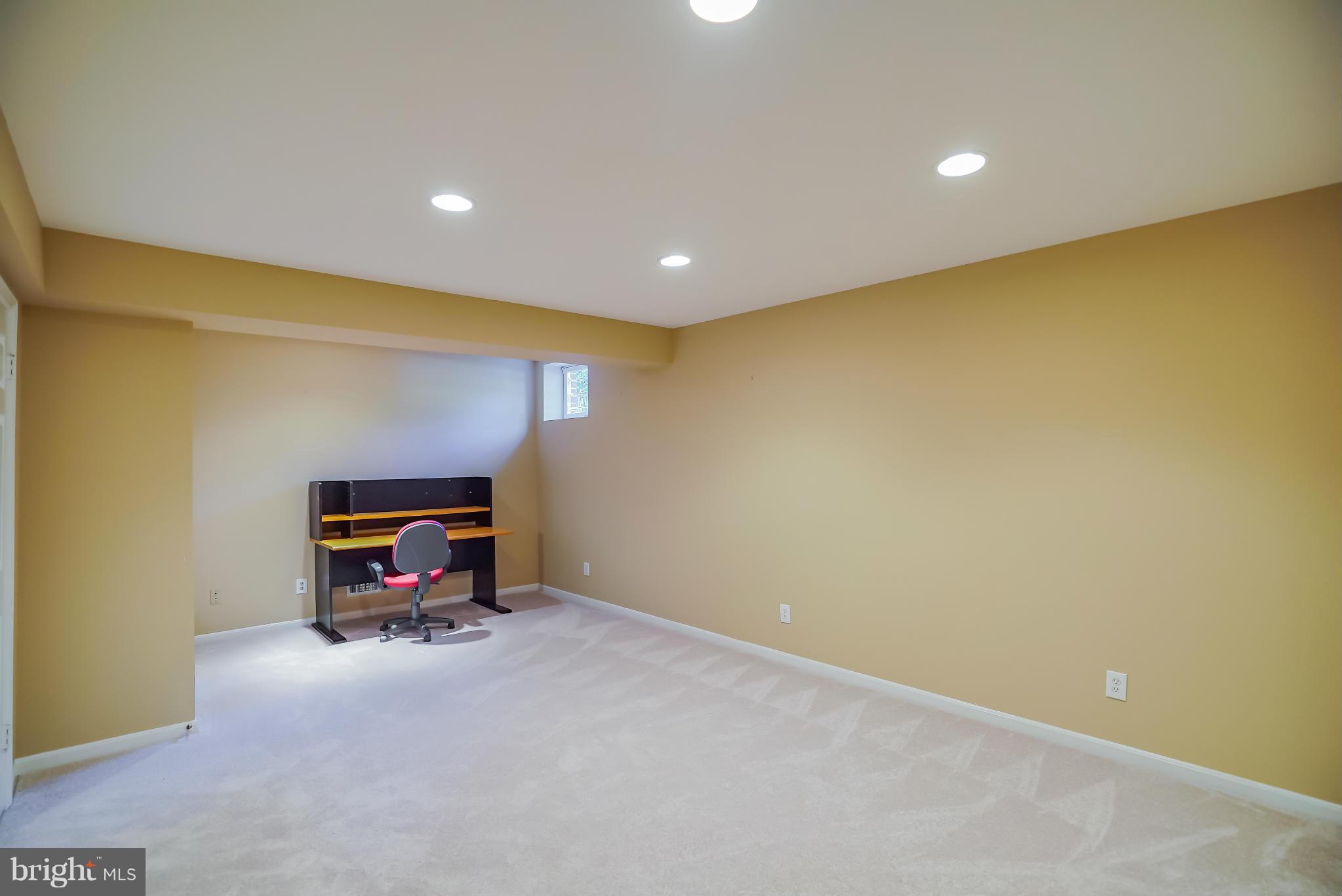 11811 Grey Birch Place Reston, VA 20191 - Photo 24 of 30 a room with furniture and a table
