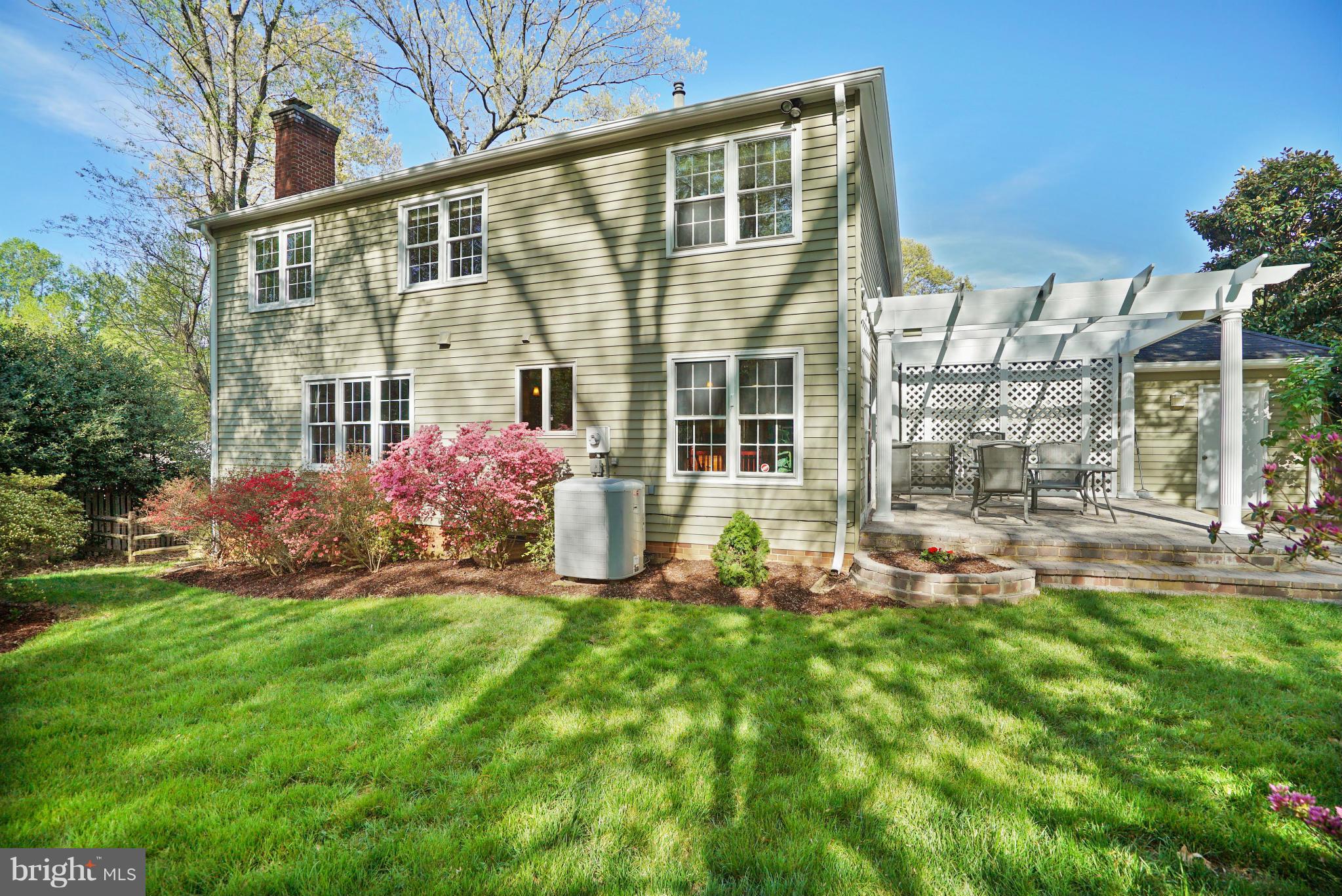 11811 Grey Birch Place Reston, VA 20191 - Photo 3 of 30 front view of a house with a yard