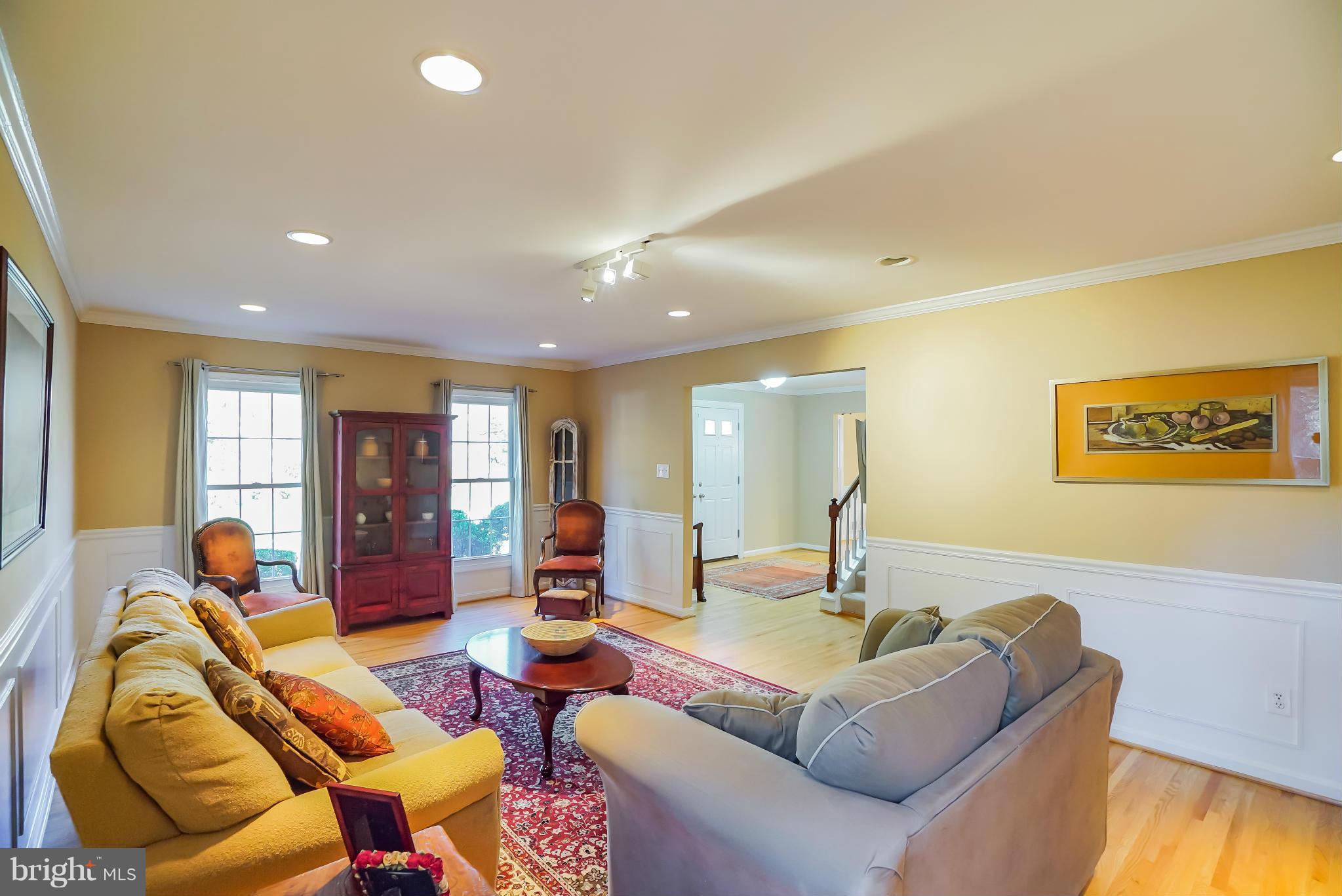 11811 Grey Birch Place Reston, VA 20191 - Photo 5 of 30 a living room with furniture and a couch