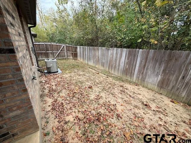 a view of balcony with wooden floor