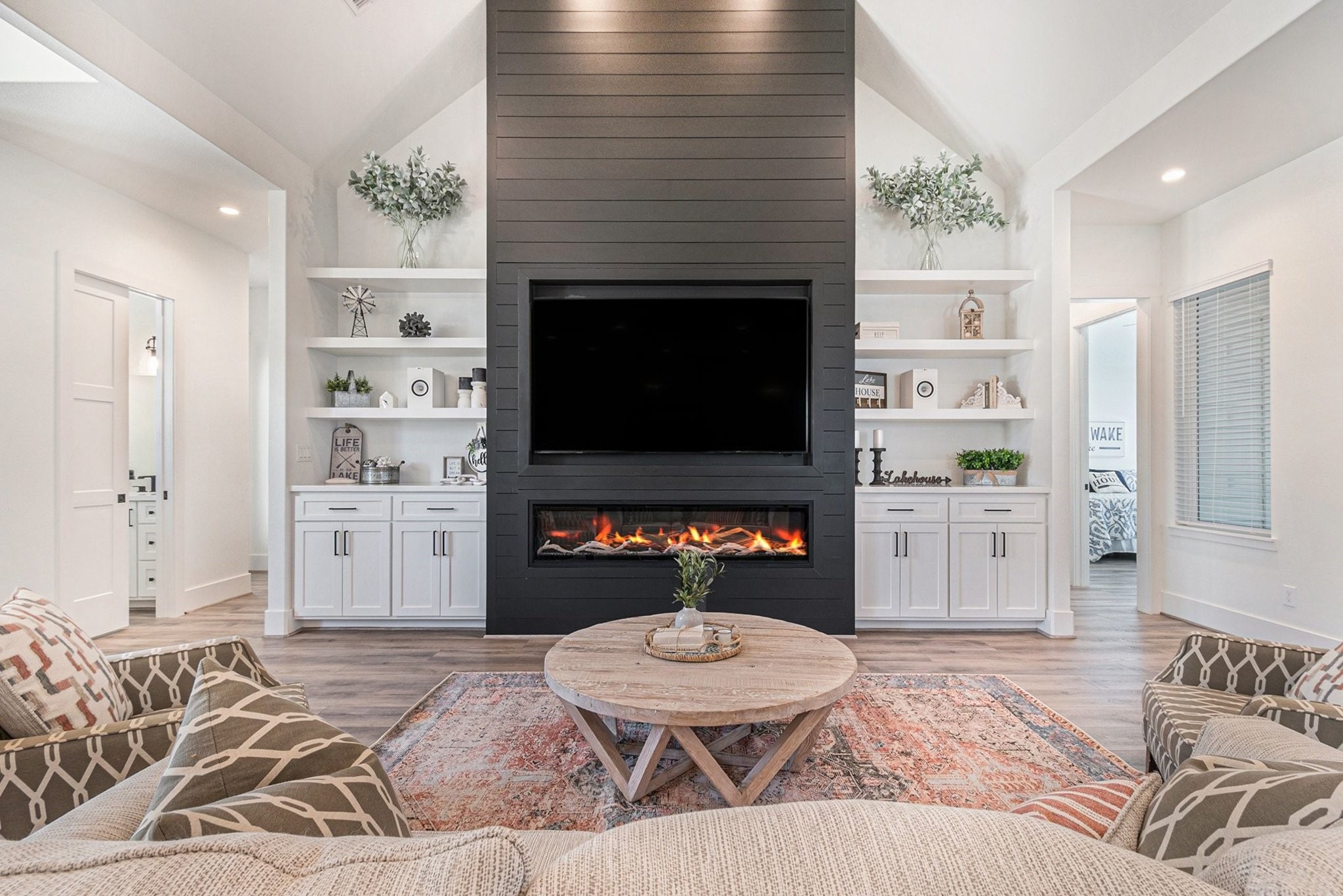 111 Seagull Path Point Blank, TX 77364 - Photo 11 of 49 Gorgeous electric fireplace heats the whole room and changes colors!