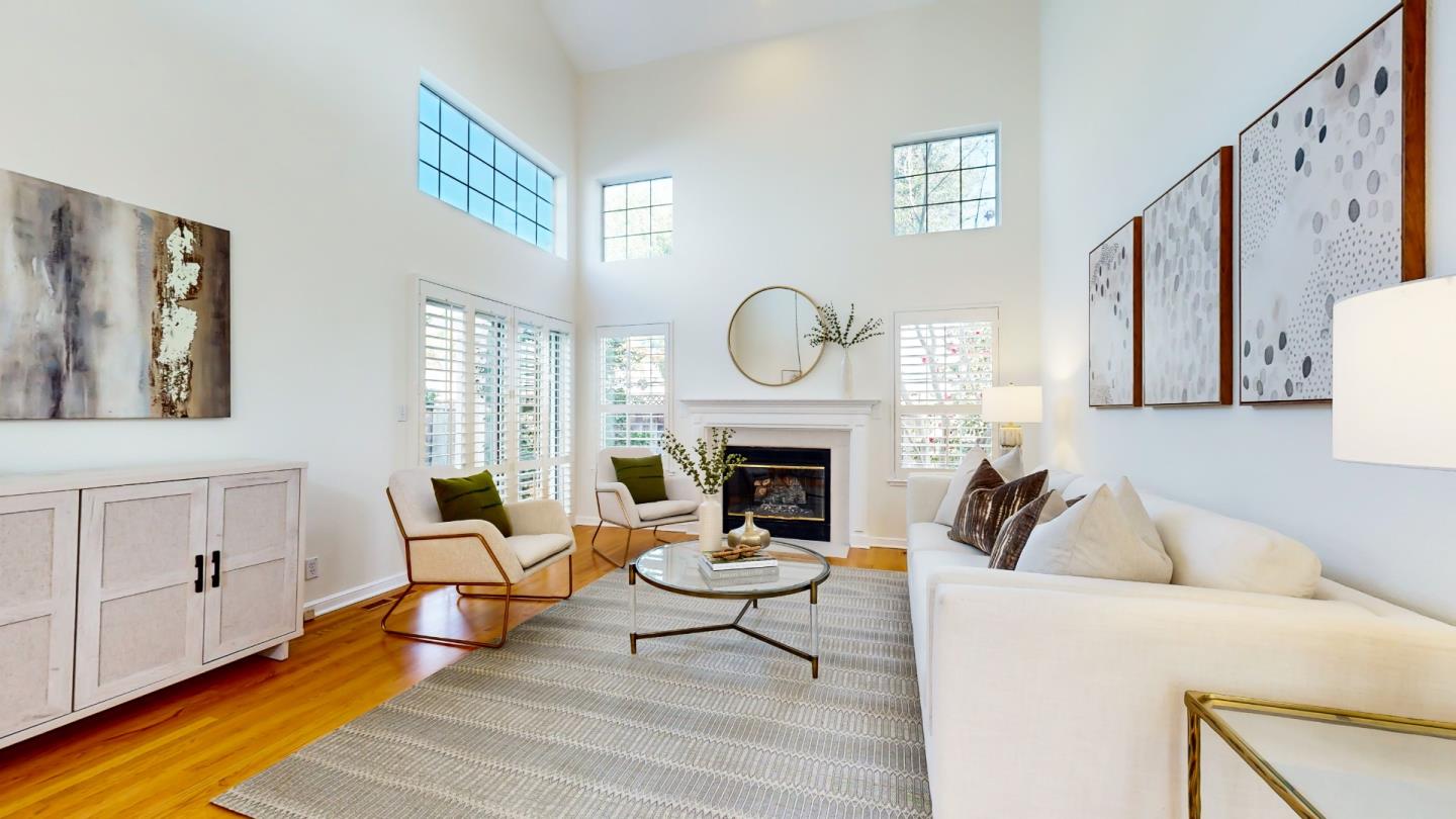 890 Windmill Park Lane Mountain View, CA 94043 - Photo 11 of 27 a living room with furniture a fireplace and a window