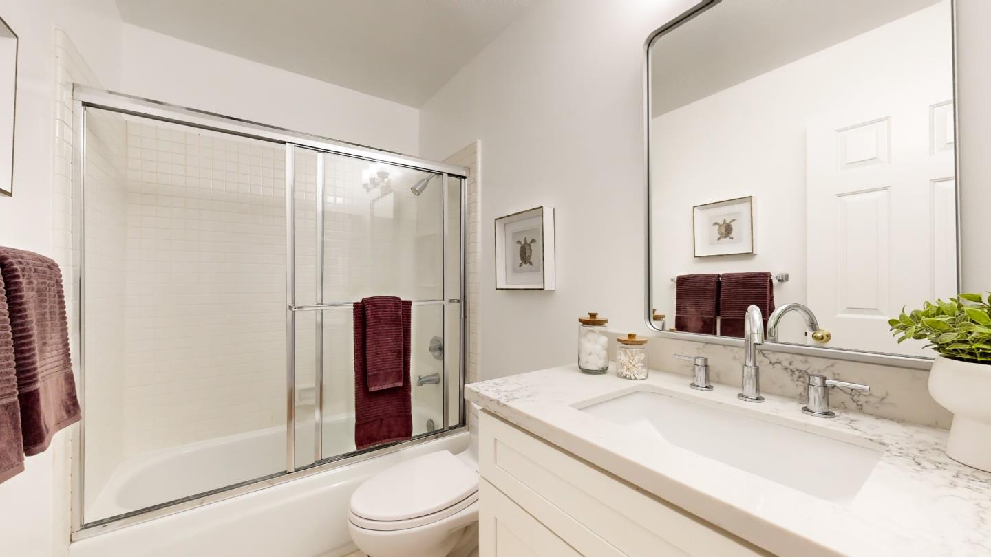 890 Windmill Park Lane Mountain View, CA 94043 - Photo 12 of 27 a bathroom with a sink a toilet and shower