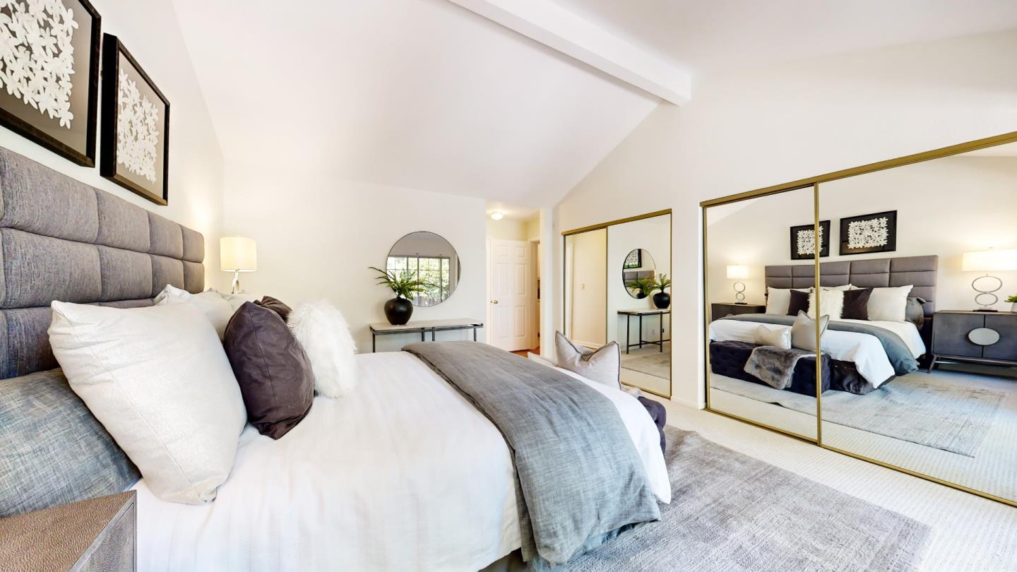 890 Windmill Park Lane Mountain View, CA 94043 - Photo 16 of 27 a bedroom with a bed and a large mirror