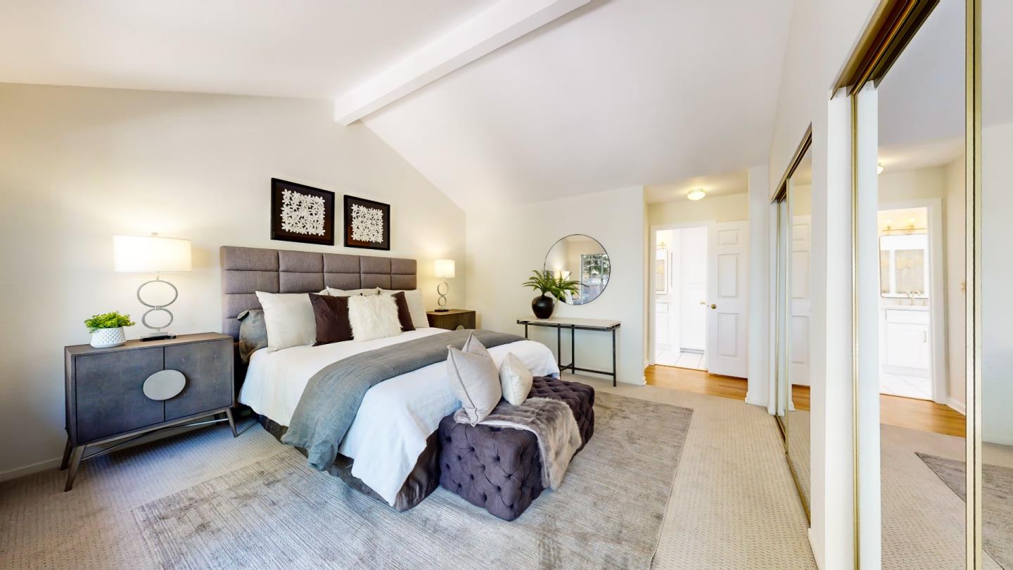 890 Windmill Park Lane Mountain View, CA 94043 - Photo 17 of 27 a spacious bedroom with a bed and a window