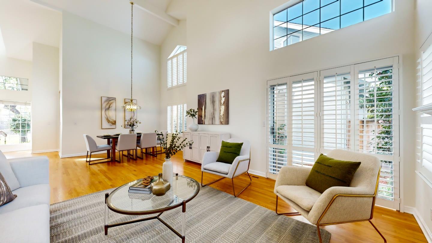 890 Windmill Park Lane Mountain View, CA 94043 - Photo 10 of 27 a living room with furniture and a large window