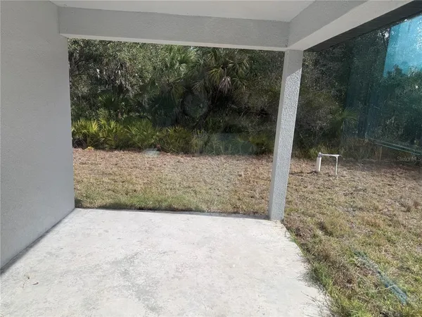 a house with trees in the background
