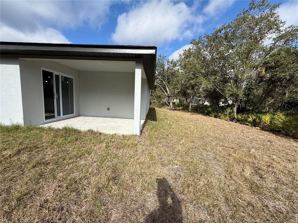 5358 Rhapsody Avenue North Port, FL 34288 - Photo 26 of 28 a view of a house with a yard
