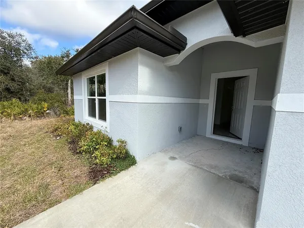 front view of a house with a small yard