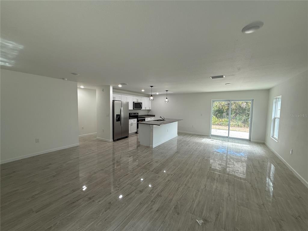 5358 Rhapsody Avenue North Port, FL 34288 - Photo 5 of 28 a view of kitchen with furniture and window