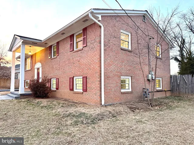 a front view of a house with stairs