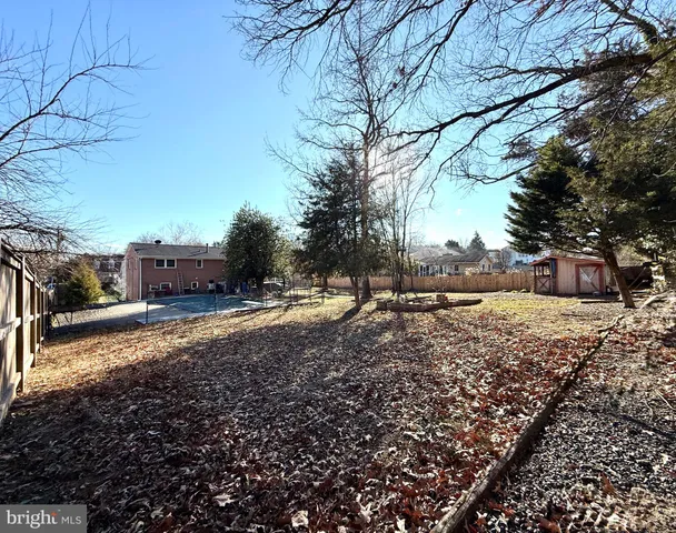 a view of backyard with outdoor space