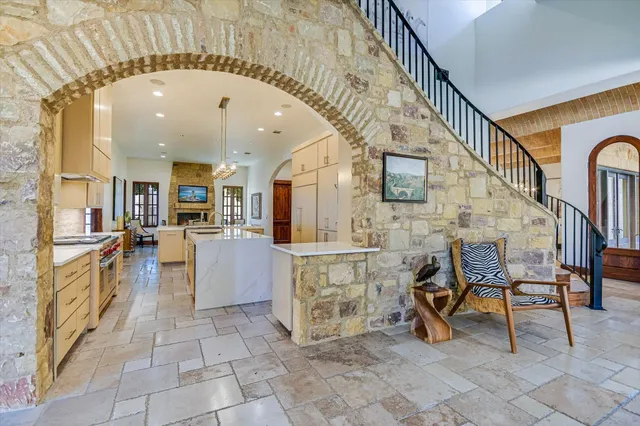 a lobby with furniture and a dining table