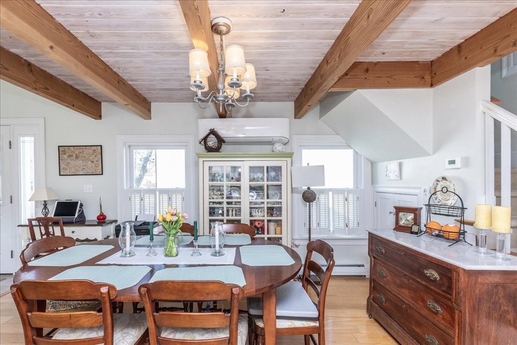 145 Evans Rd Extension Marblehead, MA 01945 - Photo 12 of 42 a view of a dining room with furniture and window