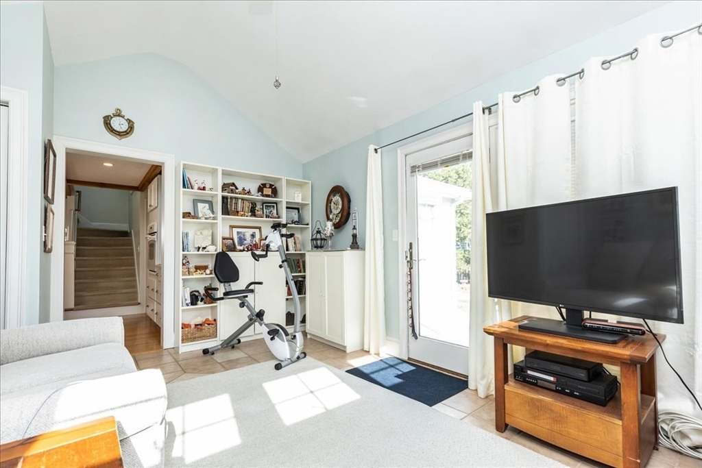 145 Evans Rd Extension Marblehead, MA 01945 - Photo 18 of 42 a living room with furniture and a flat screen tv