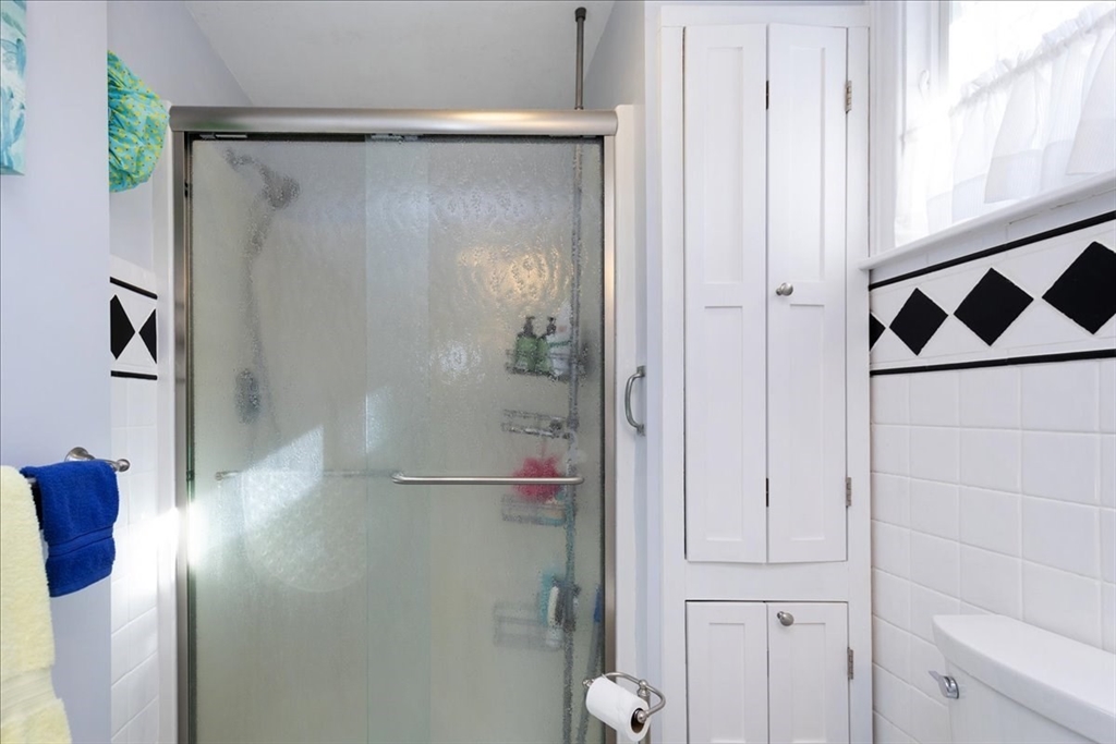 145 Evans Rd Extension Marblehead, MA 01945 - Photo 23 of 42 a bathroom with a shower and a mirror