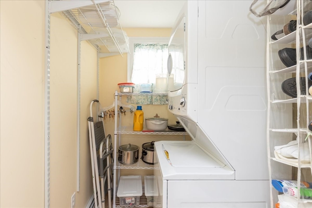 145 Evans Rd Extension Marblehead, MA 01945 - Photo 30 of 42 a view of storage and utility room with washer and dryer