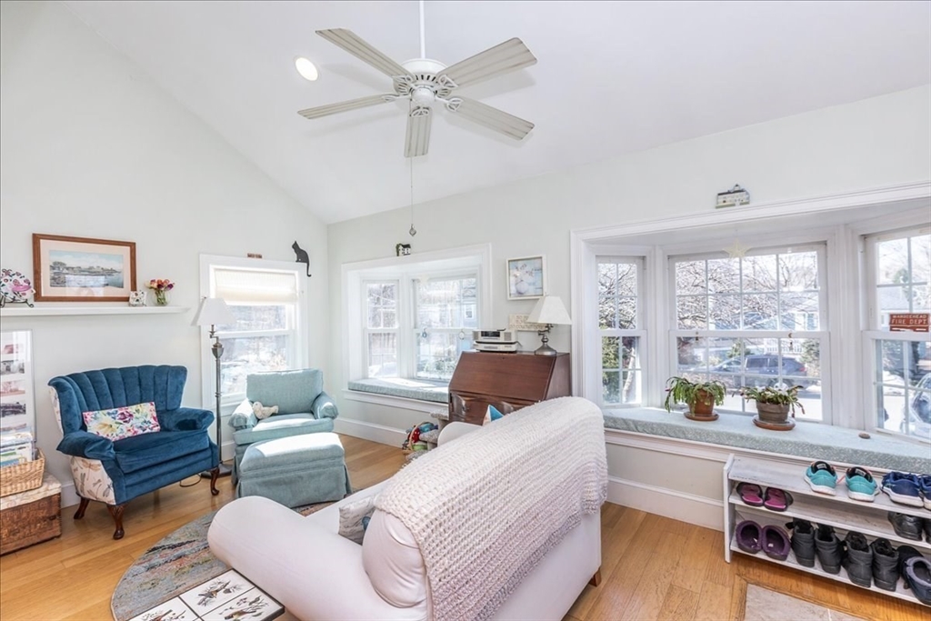 145 Evans Rd Extension Marblehead, MA 01945 - Photo 8 of 42 a living room with furniture wooden floor and a large window