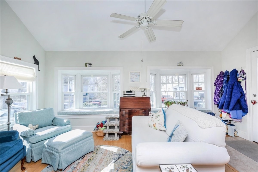 145 Evans Rd Extension Marblehead, MA 01945 - Photo 9 of 42 a living room with furniture and a large window