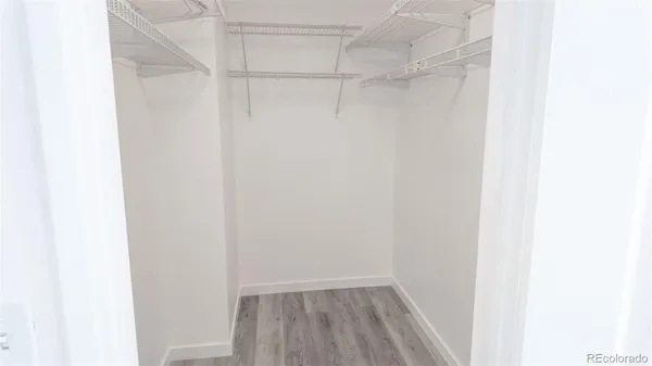 a view of a room with racks on the wall