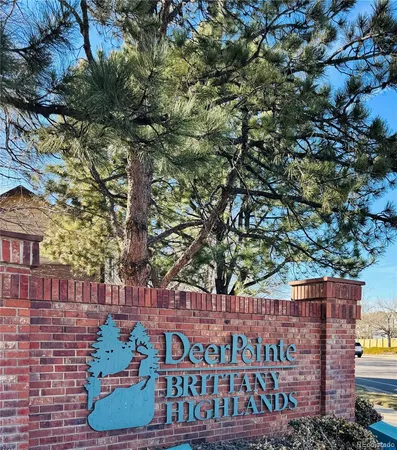 an aerial view of residential house with outdoor space and swimming pool