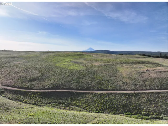 an aerial view of beach and city
