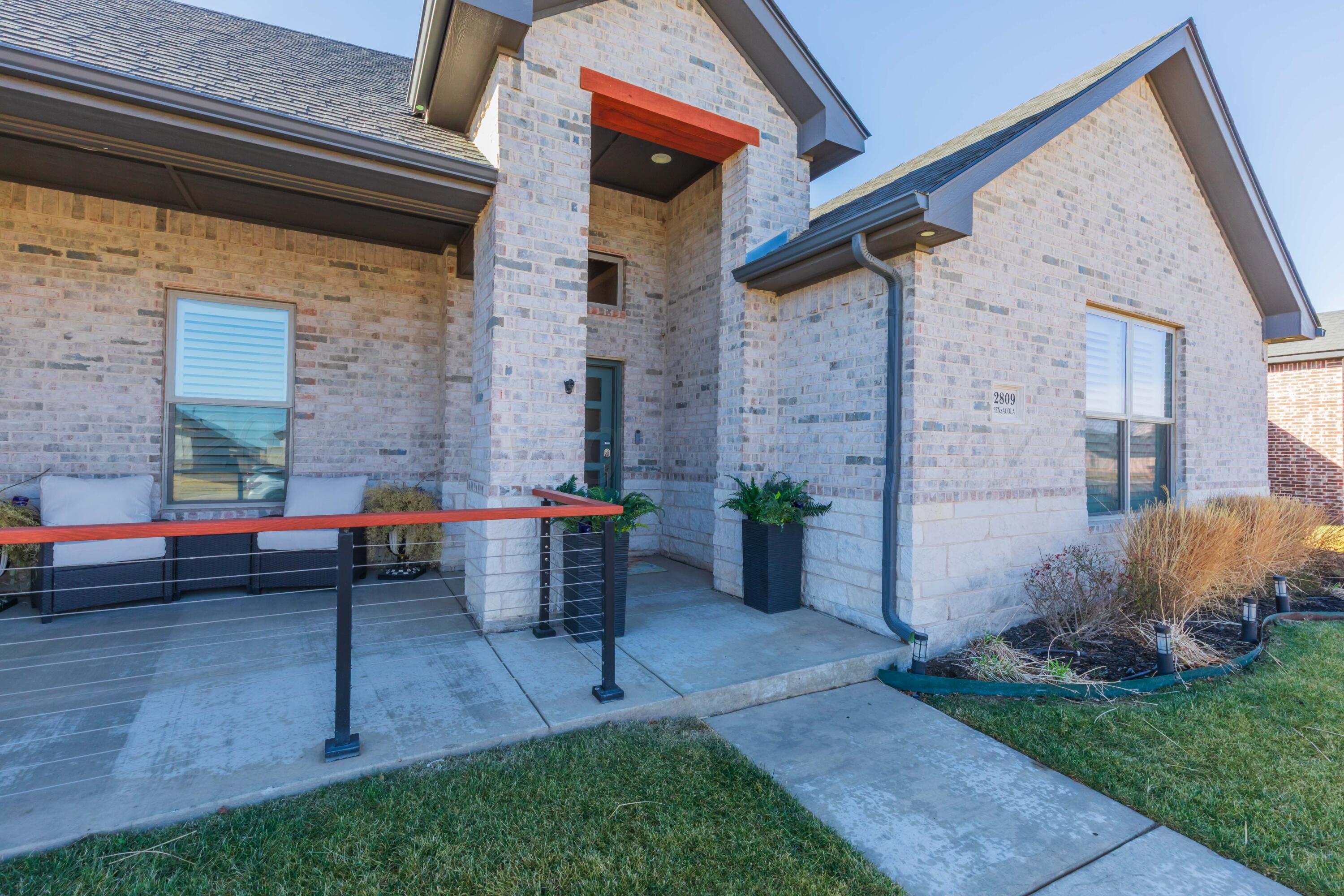 2809 Pensacola Avenue Amarillo, TX 79118 - Photo 2 of 36 a backyard of a house with outdoor seating