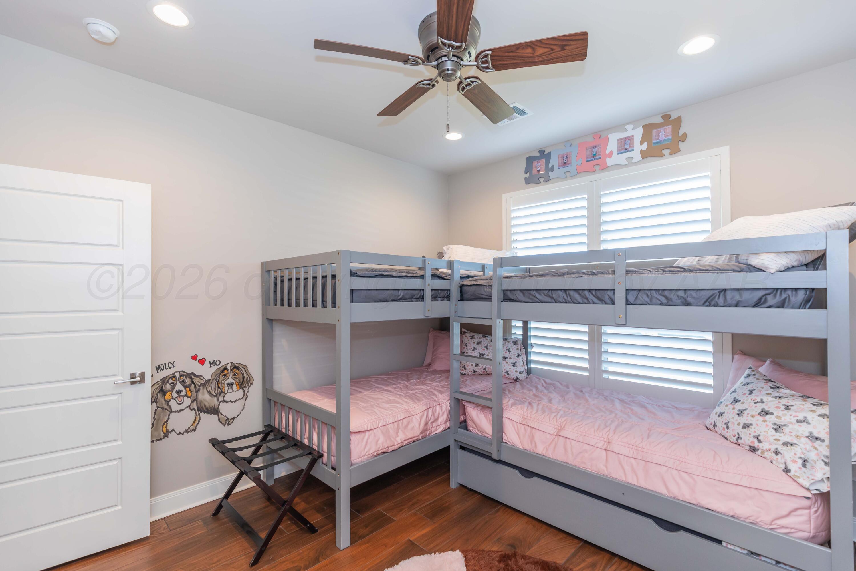 2809 Pensacola Avenue Amarillo, TX 79118 - Photo 23 of 36 a bedroom with a bed and furniture