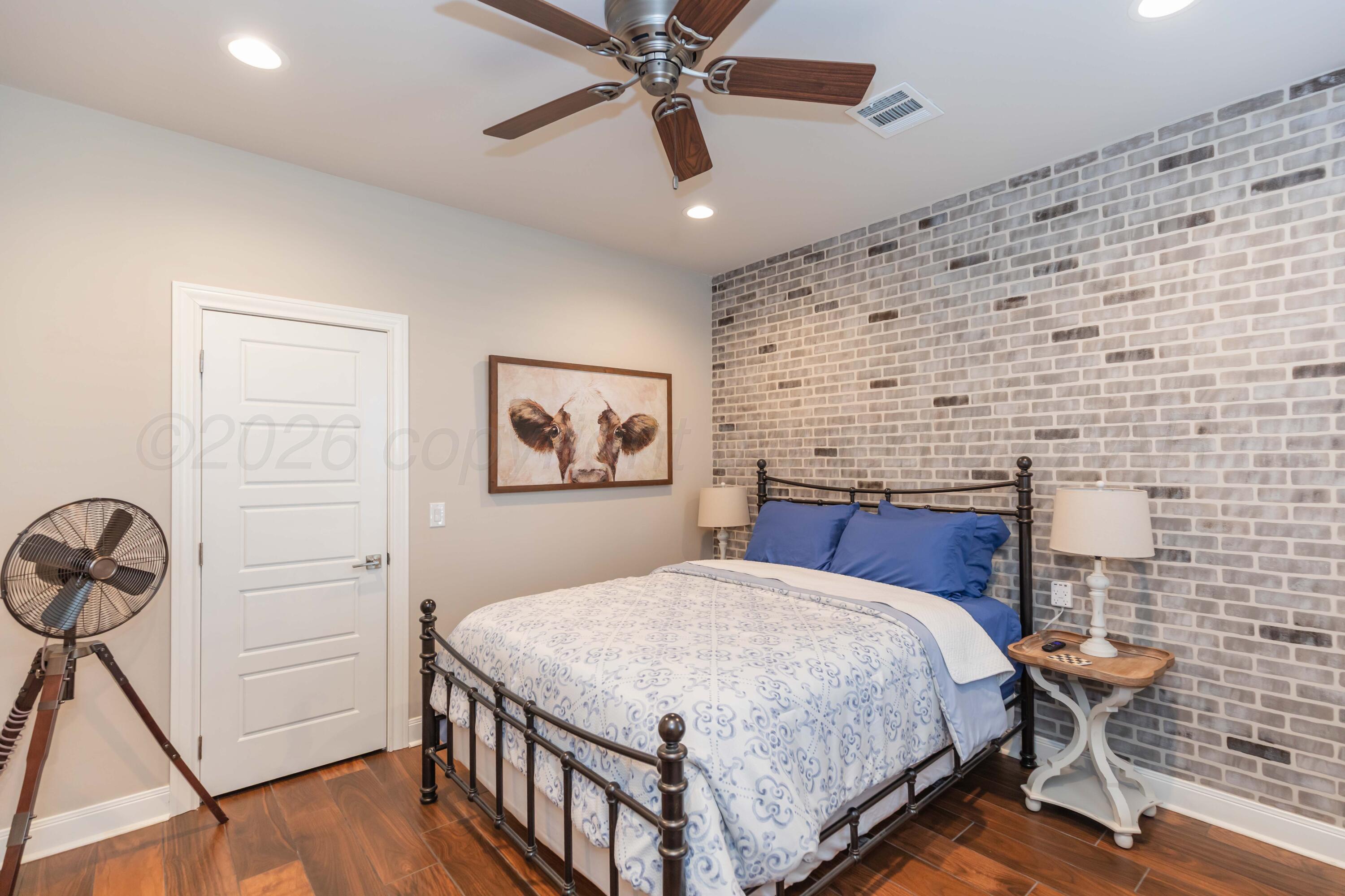 2809 Pensacola Avenue Amarillo, TX 79118 - Photo 26 of 36 a bedroom with a bed and a table