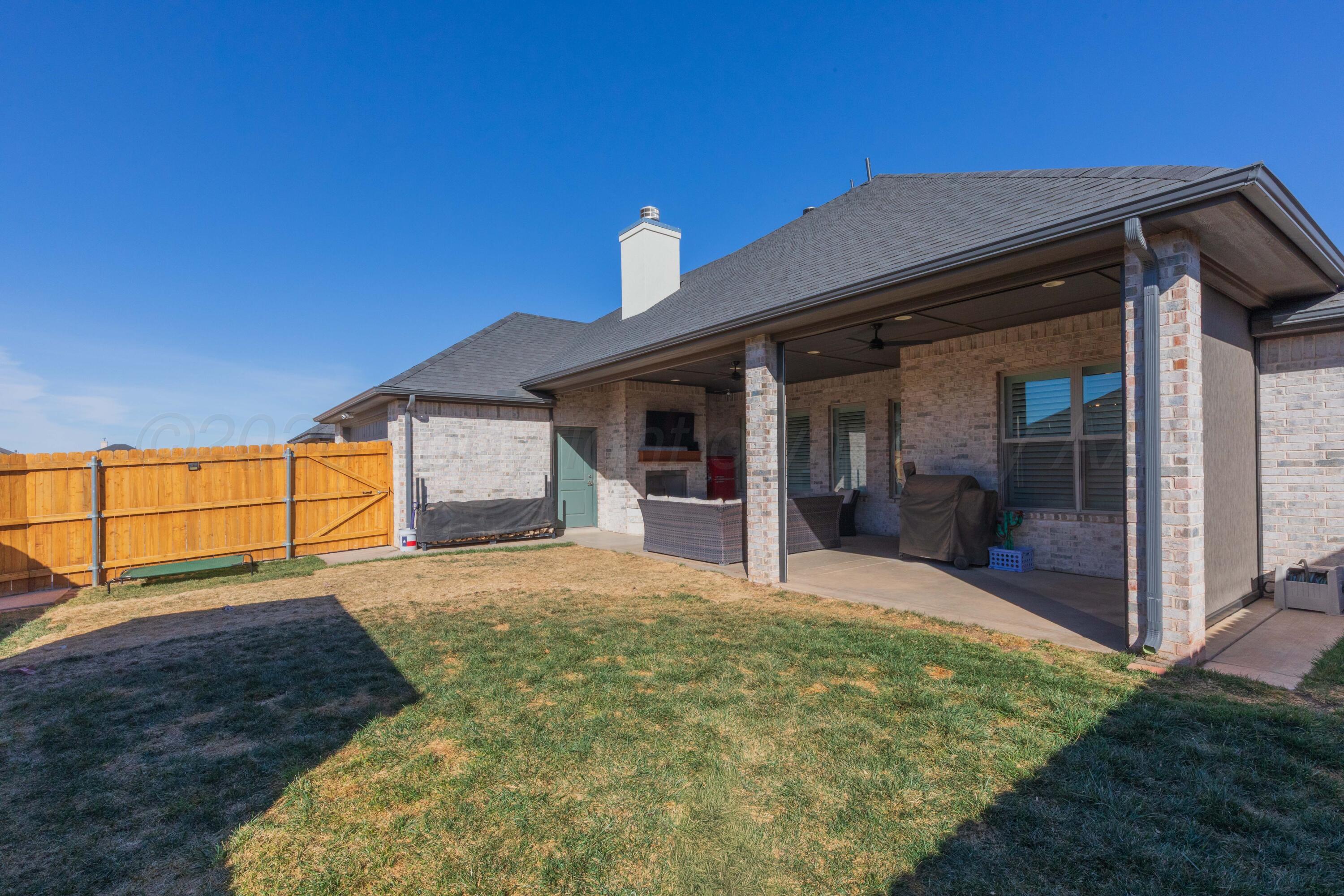 2809 Pensacola Avenue Amarillo, TX 79118 - Photo 33 of 36 a view of house with backyard and porch