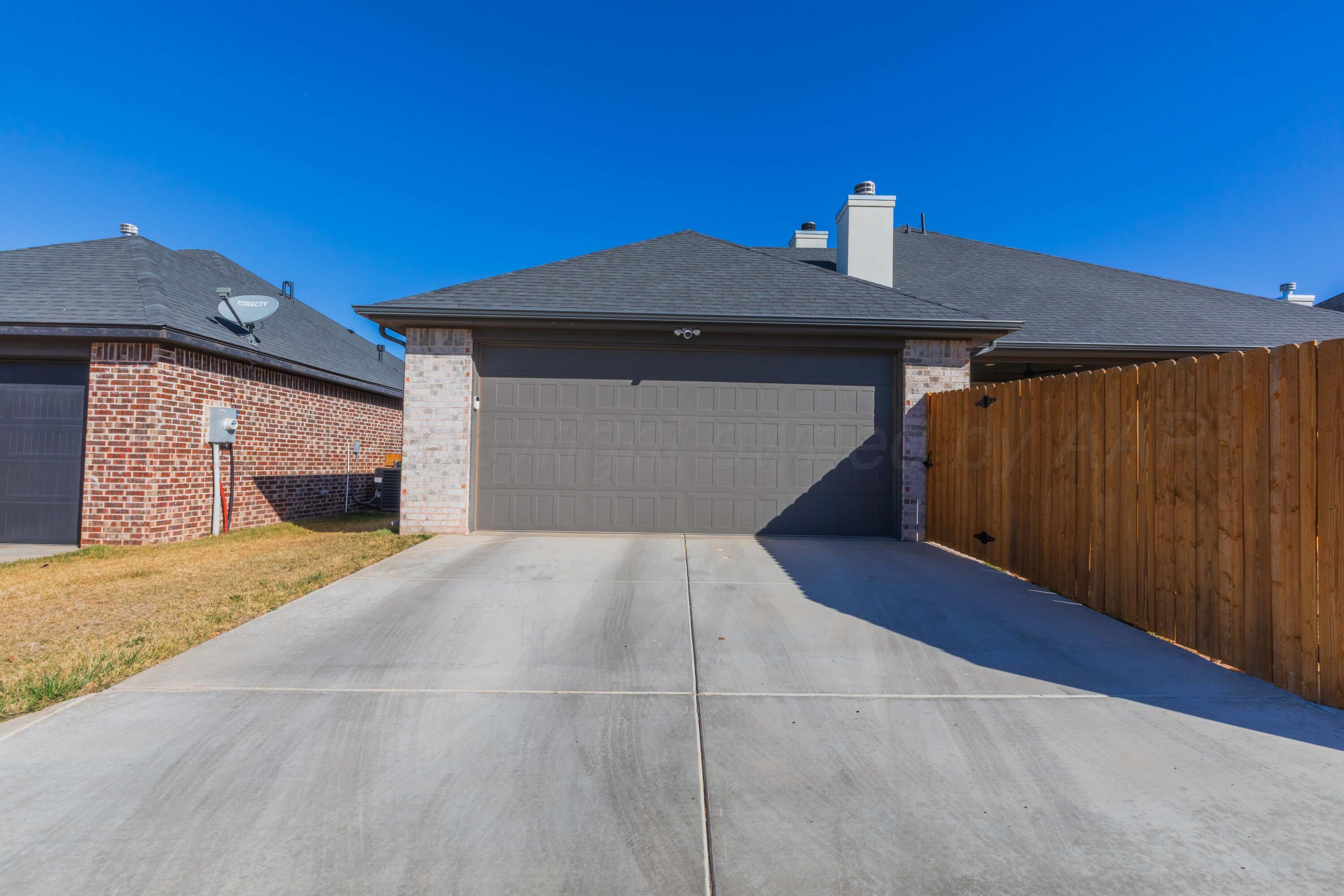2809 Pensacola Avenue Amarillo, TX 79118 - Photo 36 of 36 a front view of a house with a yard