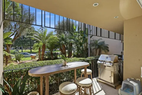 a living room with fireplace furniture and a flat screen tv