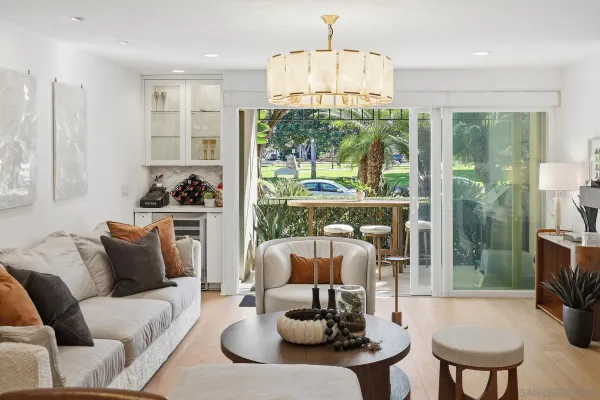 a bedroom with a bed and a television