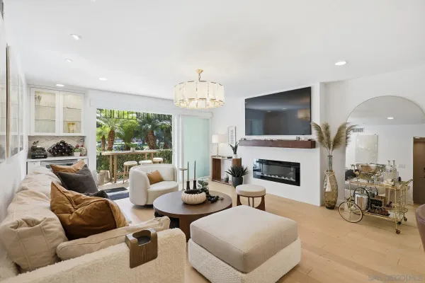 a kitchen with stainless steel appliances kitchen island granite countertop a sink and cabinets