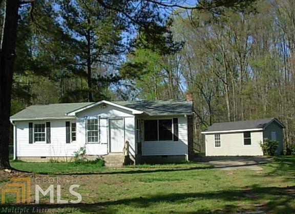 1430 Chappelear Road Madison, GA 30650 - Photo 1 of 1 a front view of a house with a yard