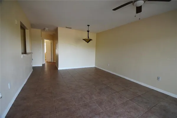 a view of a hallway with a room