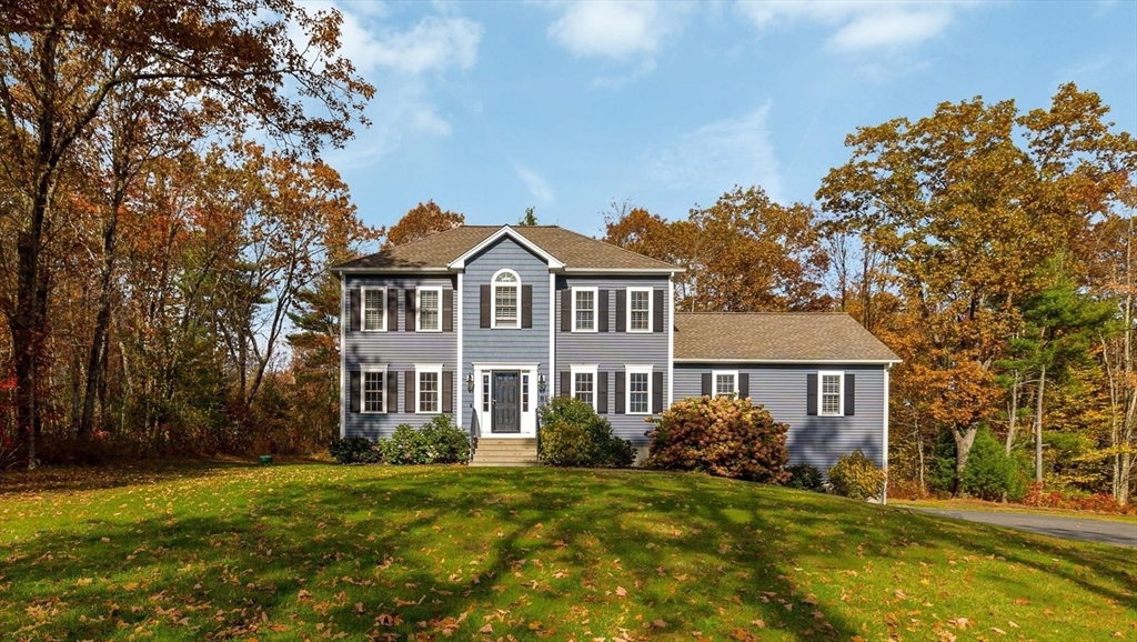 81 Central Tree Road Rutland, MA 01543 - Photo 2 of 31 a front view of a house with a garden