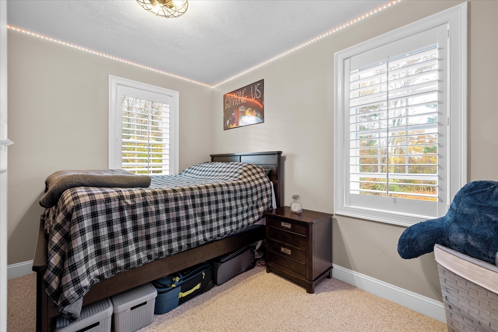 81 Central Tree Road Rutland, MA 01543 - Photo 21 of 31 a bedroom with bed and a window